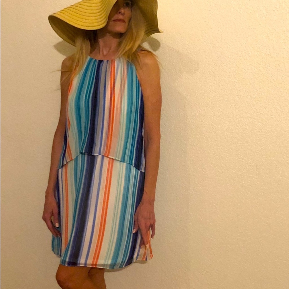 Light chiffon layered sleeveless dress.